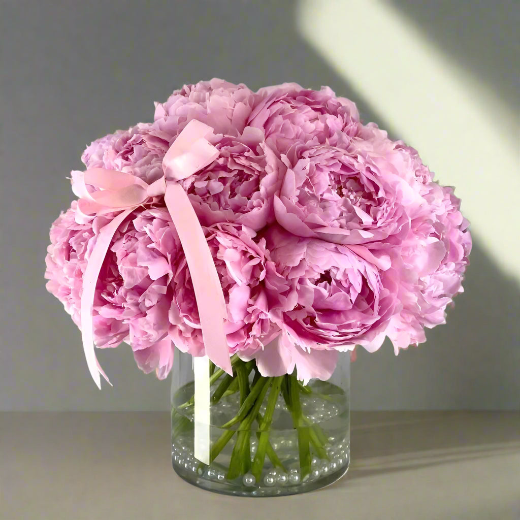 Clean And Classic Peonies In A Vase