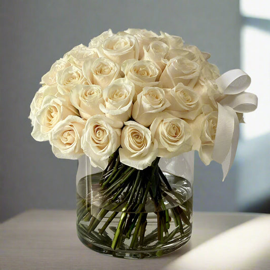 Clean And Classic White Roses In A Vase